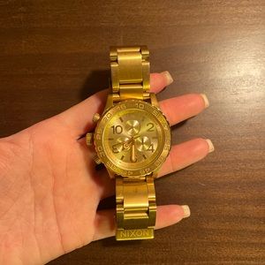 Gold Nixon watch